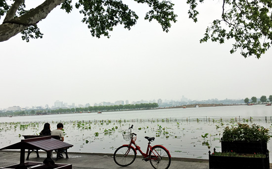Cycling West Lake area in Hangzhou.