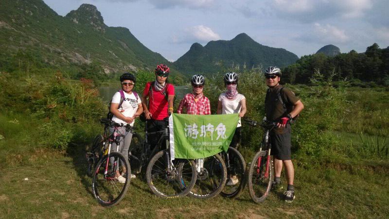Day cycle trip to Huajiang River and the logo of Youqitu (former Chinese name of GuilinCyclingTours)