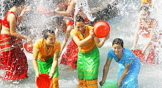 The Water-Sprinkling Festival of Xishuangbana, Bike Tour Experience in Yunnan of China.